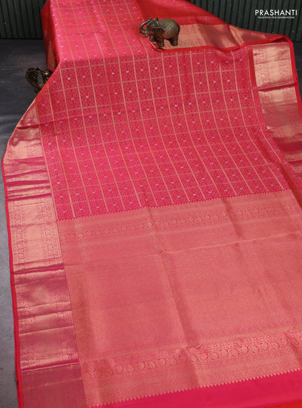 Pure kanchipuram silk saree dual shade of pinkish orange with allover zari woven brocade weaves and rich zari woven border