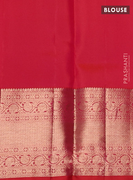 Pure kanchipuram silk saree dual shade of pinkish orange with allover zari woven brocade weaves and rich zari woven border
