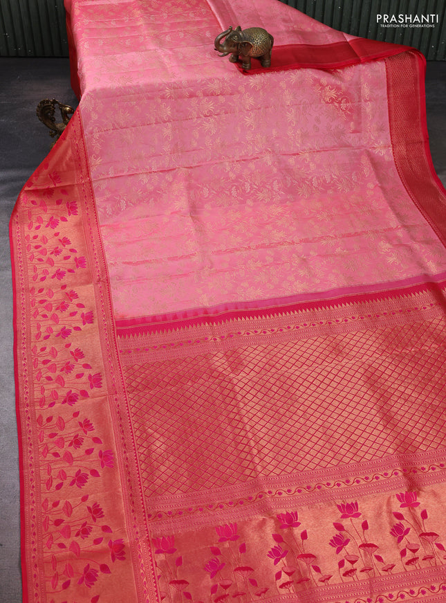 Pure kanchipuram silk saree peach shade and pink with allover zari woven brocade weaves and rich zari woven border