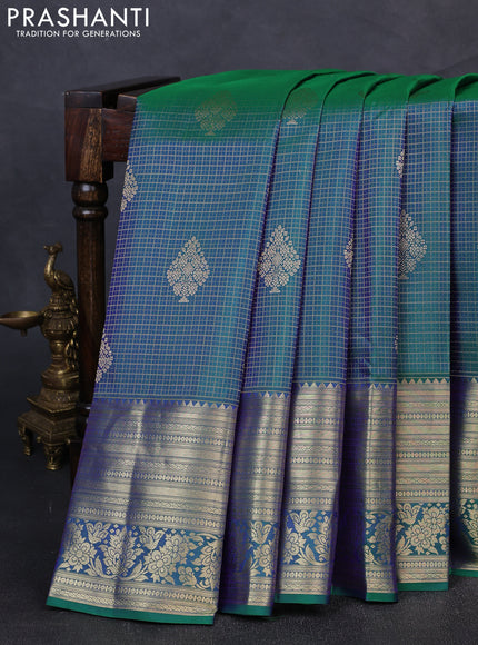 Pure kanchipuram silk saree dual shade of greenish blue with allover zari woven brocade weaves and rich zari woven border
