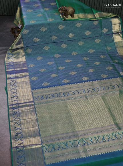 Pure kanchipuram silk saree dual shade of greenish blue with allover zari woven brocade weaves and rich zari woven border