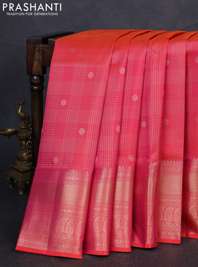 Pure kanchipuram silk saree dual shade of pinkish orange with allover zari woven brocade weaves and rich zari woven border