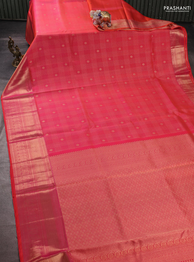 Pure kanchipuram silk saree dual shade of pinkish orange with allover zari woven brocade weaves and rich zari woven border