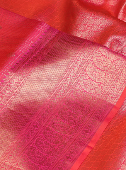 Pure kanchipuram silk saree dual shade of pinkish orange with allover zari woven brocade weaves and rich zari woven border