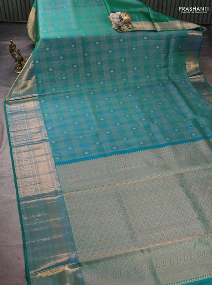 Pure kanchipuram silk saree dual shade of teal green with allover zari woven brocade weaves and rich zari woven border