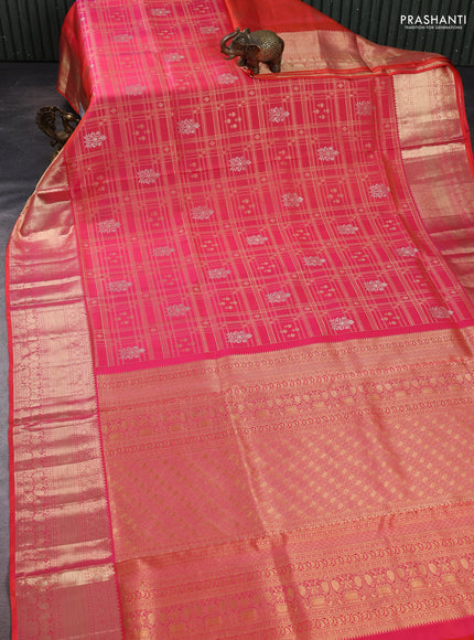 Pure kanchipuram silk saree dual shade of pinkish orange with allover zari woven brocade weaves and rich zari woven border