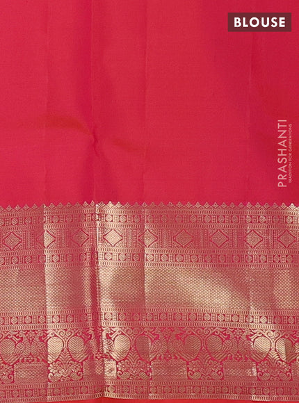 Pure kanchipuram silk saree dual shade of pinkish orange with allover zari woven brocade weaves and rich zari woven border