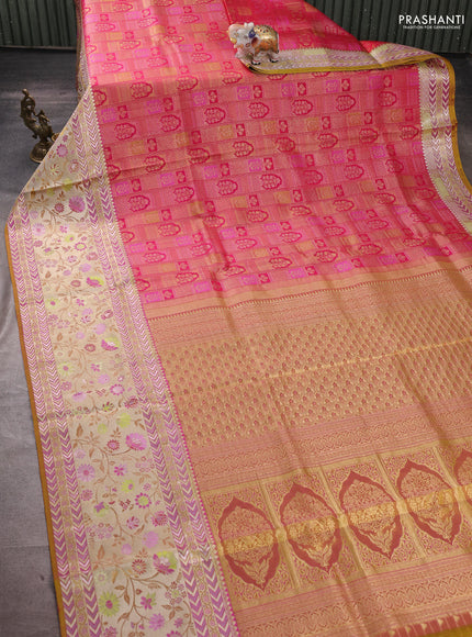 Pure kanchipuram silk saree pink and dual shade of mustard with allover zari woven brocade weaves and rich zari woven meenakari border