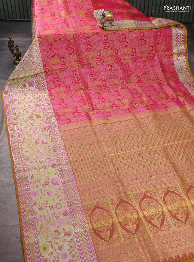 Pure kanchipuram silk saree pink and dual shade of mustard with allover zari woven brocade weaves and rich zari woven meenakari border