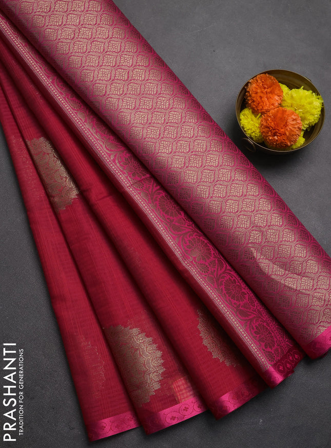 Banarasi semi dupion saree pinkish orange with allover thread & zari woven buttas and small thread woven border