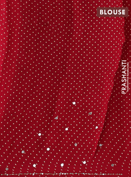 Modal silk saree tomato red with allover ajrakh prints and mirror & sequin embroidery pallu