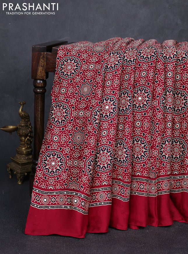 Modal silk saree maroon with allover ajrakh prints and mirror & sequin embroidery pallu