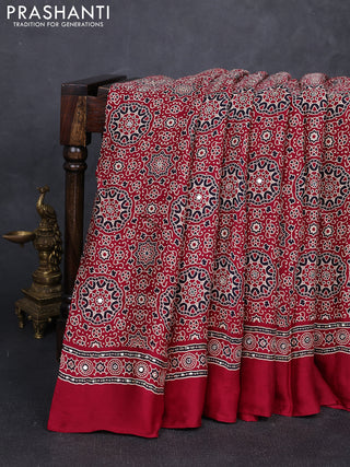 Modal silk saree maroon with allover ajrakh prints and mirror & sequin embroidery pallu