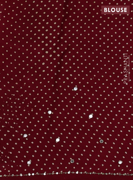 Modal silk saree maroon with allover ajrakh prints and mirror & sequin embroidery pallu