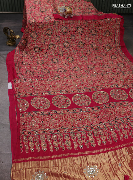 Modal silk saree pink with allover ajrakh prints and mirror & sequin embroidery pallu