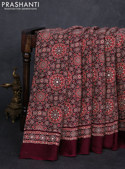 Modal silk saree deep maroon with allover ajrakh prints and mirror & sequin embroidery pallu