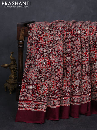 Modal silk saree deep maroon with allover ajrakh prints and mirror & sequin embroidery pallu
