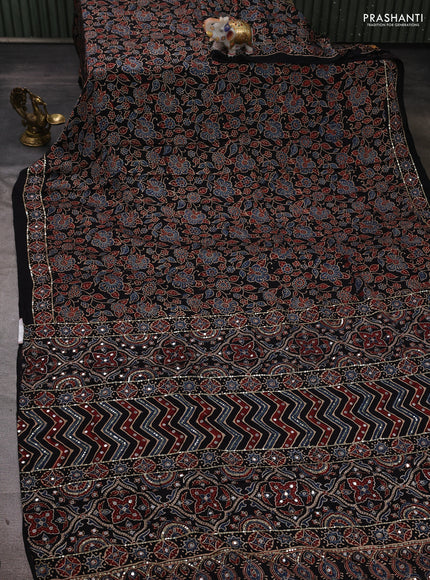 Modal silk saree black with allover ajrakh prints and mirror & sequin embroidery pallu