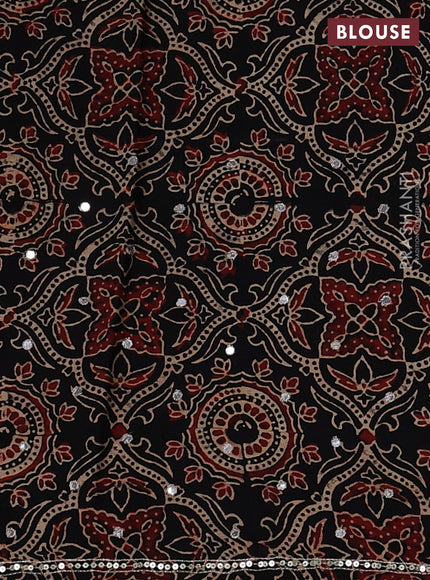 Modal silk saree black with allover ajrakh prints and mirror & sequin embroidery pallu