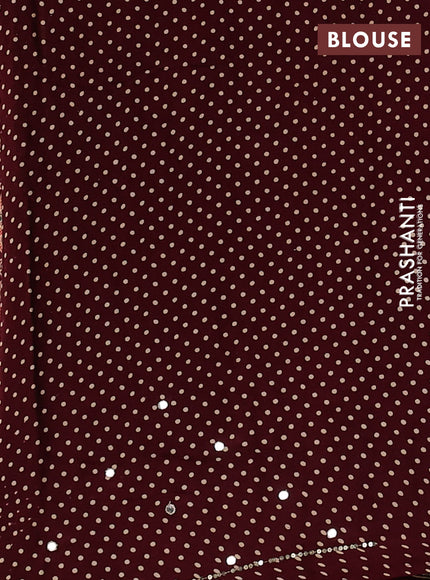 Modal silk saree deep maroon with allover ajrakh prints and mirror & sequin embroidery pallu