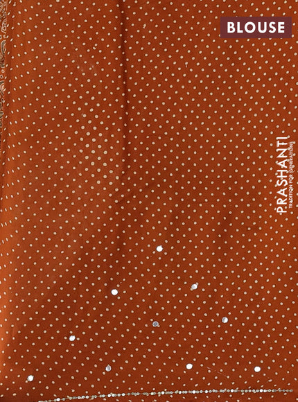 Modal silk saree dark mustard with allover ajrakh prints and mirror & sequin embroidery pallu