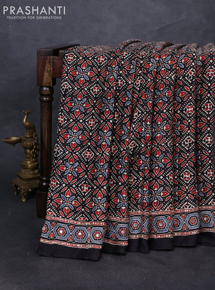 Modal silk saree black with allover ajrakh prints and mirror & sequin embroidery pallu
