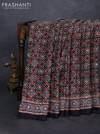 Modal silk saree black with allover ajrakh prints and mirror & sequin embroidery pallu