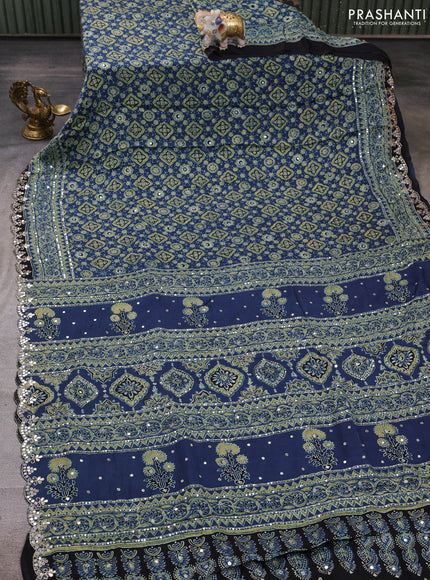 Modal silk saree indigo blue and black with allover ajrakh prints and mirror & sequin embroidery pallu