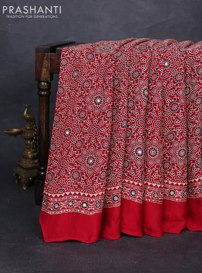 Modal silk saree tomato red with allover ajrakh prints and mirror & sequin embroidery pallu