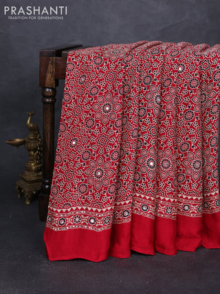 Modal silk saree tomato red with allover ajrakh prints and mirror & sequin embroidery pallu