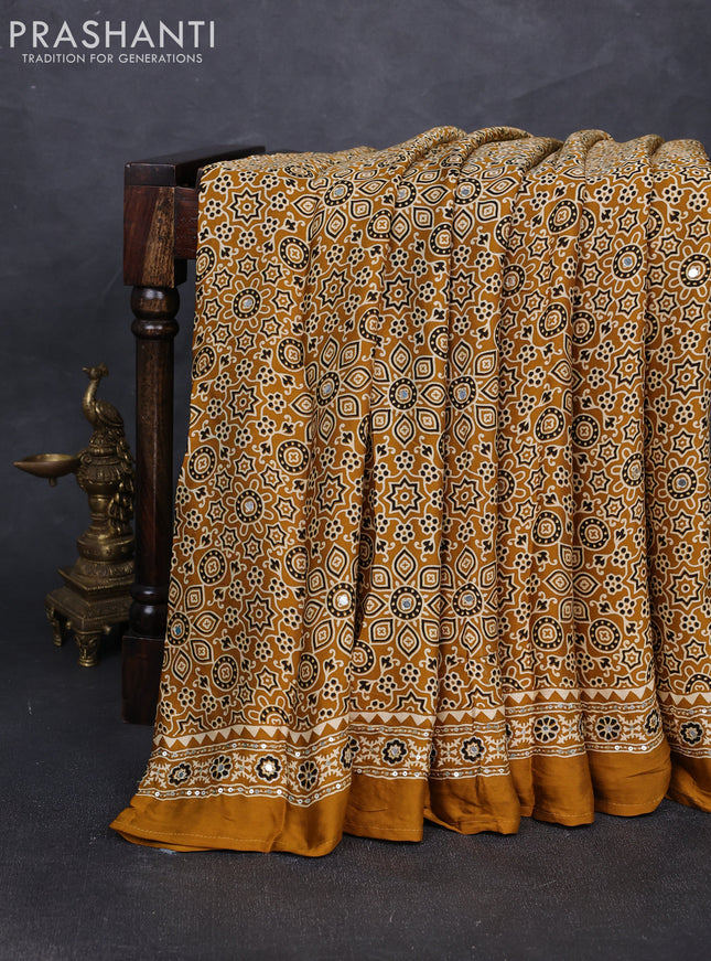 Modal silk saree dark mustard with allover ajrakh prints and mirror & sequin embroidery pallu