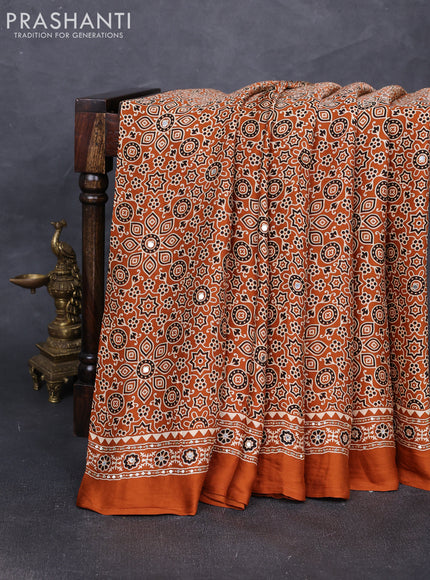 Modal silk saree dark mustard with allover ajrakh prints and mirror & sequin embroidery pallu