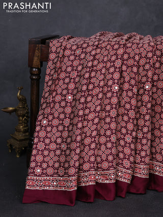 Modal silk saree wine with allover ajrakh prints and mirror & sequin embroidery pallu