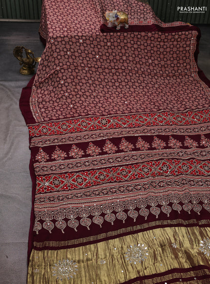 Modal silk saree wine with allover ajrakh prints and mirror & sequin embroidery pallu