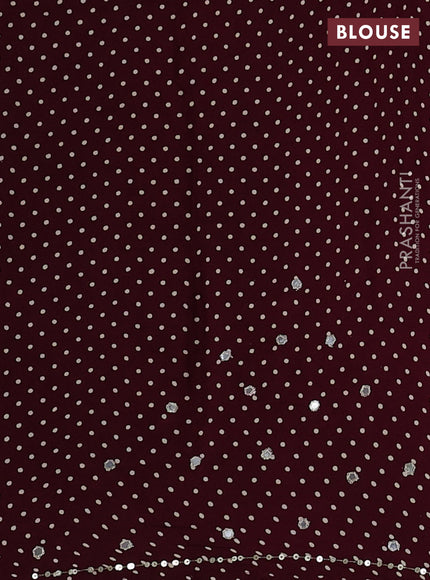 Modal silk saree wine with allover ajrakh prints and mirror & sequin embroidery pallu