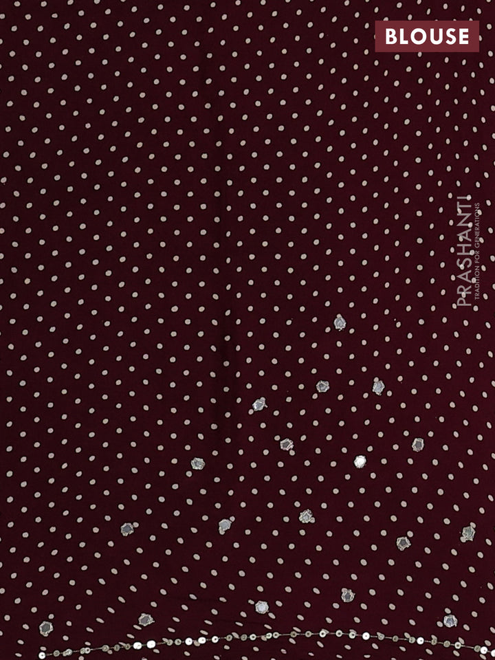 Modal silk saree wine with allover ajrakh prints and mirror & sequin embroidery pallu