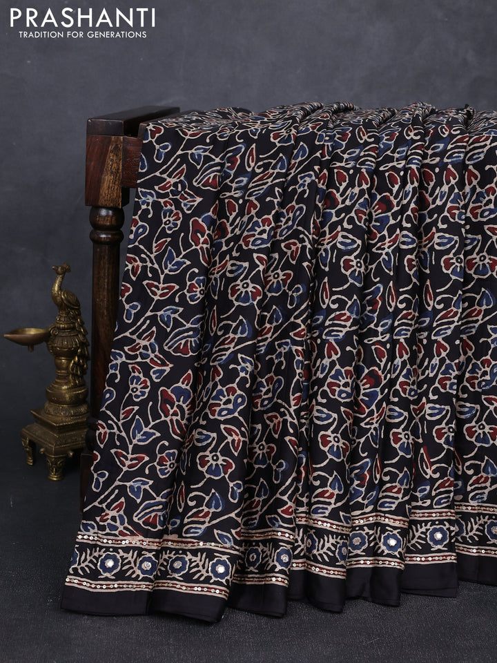 Modal silk saree black with allover ajrakh prints and mirror & sequin embroidery pallu