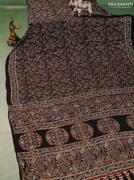 Modal silk saree black with allover ajrakh prints and mirror & sequin embroidery pallu