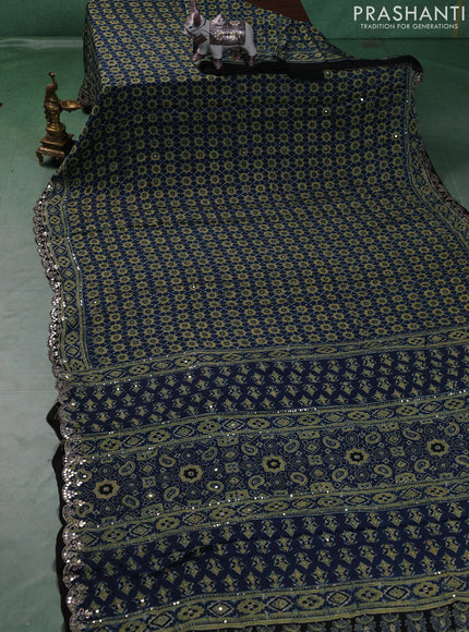 Modal silk saree indigo blue and black with allover ajrakh prints and mirror & sequin embroidery pallu