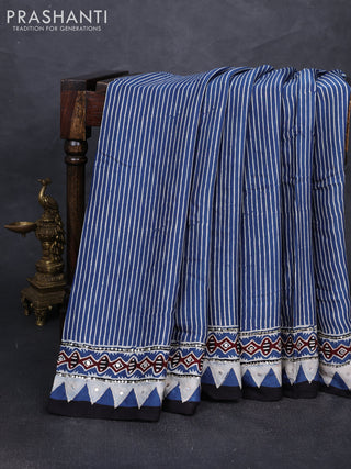 Modal silk saree indigo blue with allover stripe prints and ajrakh prints mirror & sequin embroidery pallu
