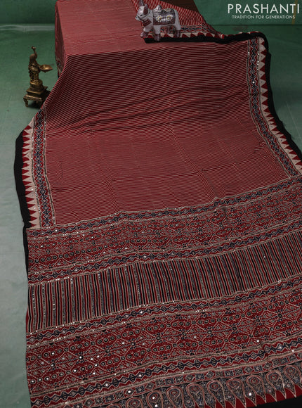 Modal silk saree maroon with allover stripe prints and ajrakh prints mirror & sequin embroidery pallu