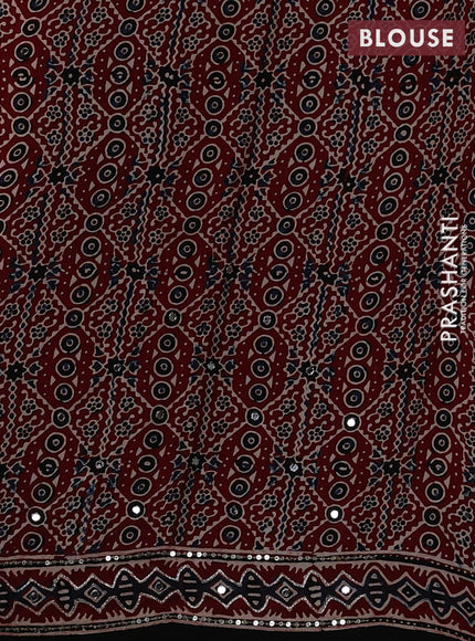 Modal silk saree maroon with allover stripe prints and ajrakh prints mirror & sequin embroidery pallu