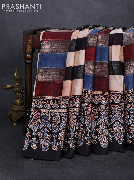 Modal silk saree black with allover geometric prints and ajrakh prints mirror & sequin embroidery pallu