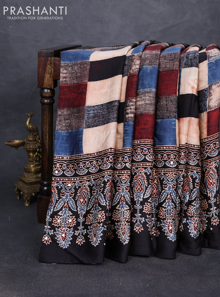 Modal silk saree black with allover geometric prints and ajrakh prints mirror & sequin embroidery pallu
