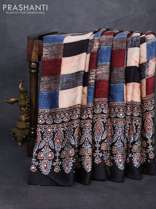 Modal silk saree black with allover geometric prints and ajrakh prints mirror & sequin embroidery pallu