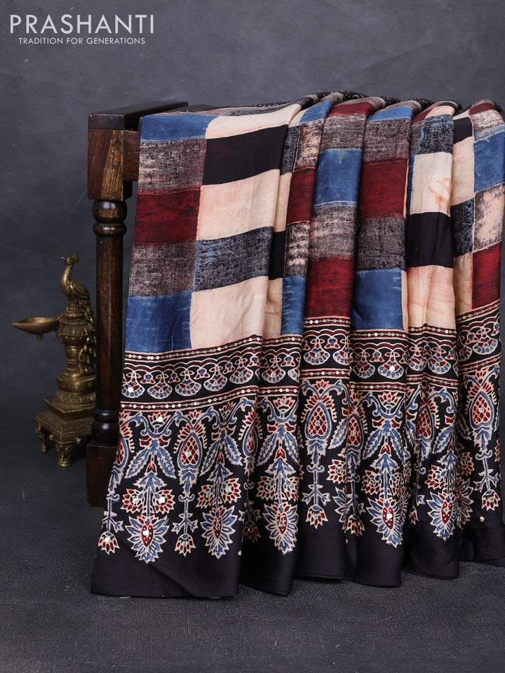 Modal silk saree black with allover geometric prints and ajrakh prints mirror & sequin embroidery pallu