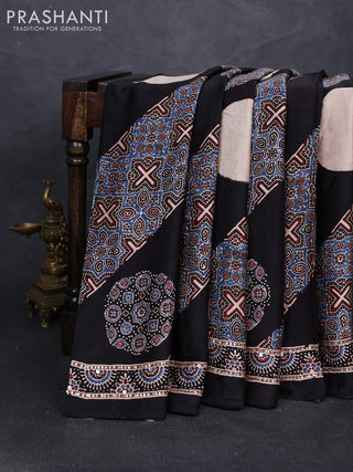 Modal silk saree black with ajrakh prints and mirror & sequin embroidery pallu
