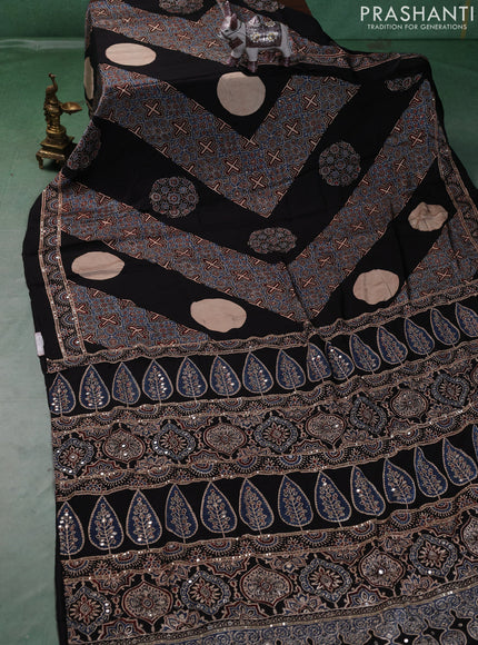 Modal silk saree black with ajrakh prints and mirror & sequin embroidery pallu