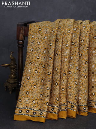 Modal silk saree mustard yellow with allover ajrakh prints and mirror & sequin embroidery pallu