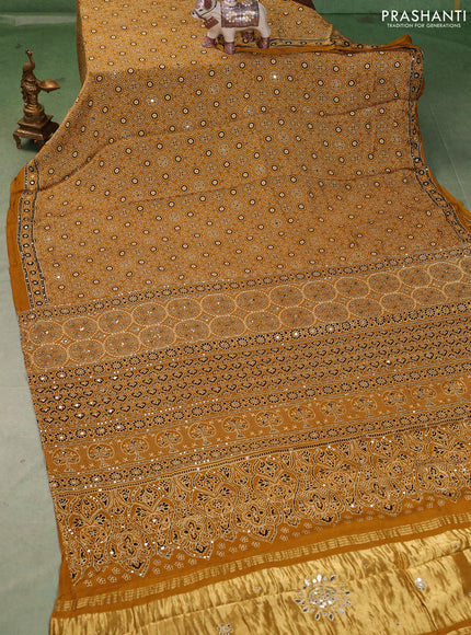 Modal silk saree mustard yellow with allover ajrakh prints and mirror & sequin embroidery pallu